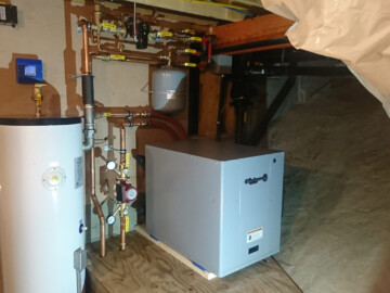3 ton geothermal heat pump system heating radiant floors.